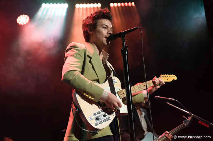 Harry Styles’ Guitar, Bono’s Handwritten Lyrics & More Celebrity Memorabilia Sold at Auction to Benefit MusiCares