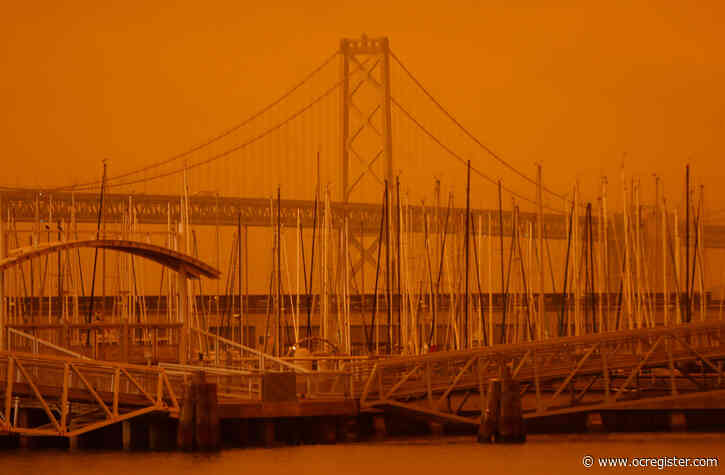 Orange glow turns dark and gray in Bay Area as wildfires rage