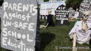 Former teacher creates morbid display on front lawn protesting back-to-school plan