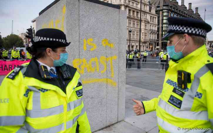 Extinction Rebellion protesters deface Churchill statue despite police presence