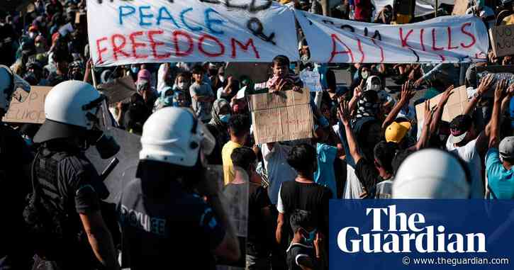Lesbos refugees protest after devastating camp fire – video report