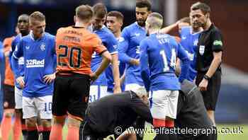 Alfredo Morelos carried off during Rangers’ 4-0 win over Dundee United