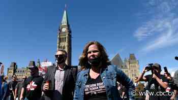 Pro-gun marchers speak out on federal government's assault weapons ban