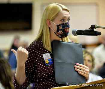 The Latest: Michigan St Univ Wants Students to Quarantine