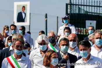 Italy's PM attends funeral of young black man beaten to death near Rome