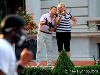 Nine protesters confronted by gun-toting couple backed by Trump issued trespassing citations