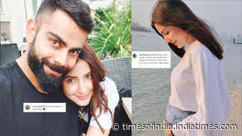 Anushka Sharma shares a beautiful picture adoring her baby bump, hubby Virat Kohli writes 'My whole world in one frame'