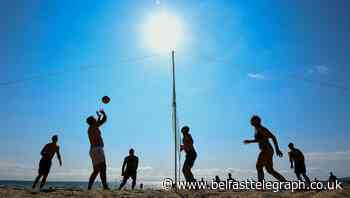 In Pictures: Sunseekers soak up early autumn sunshine