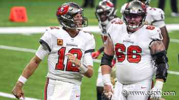 Tom Brady emphatically spikes the ball after rushing for Bucs' first TD