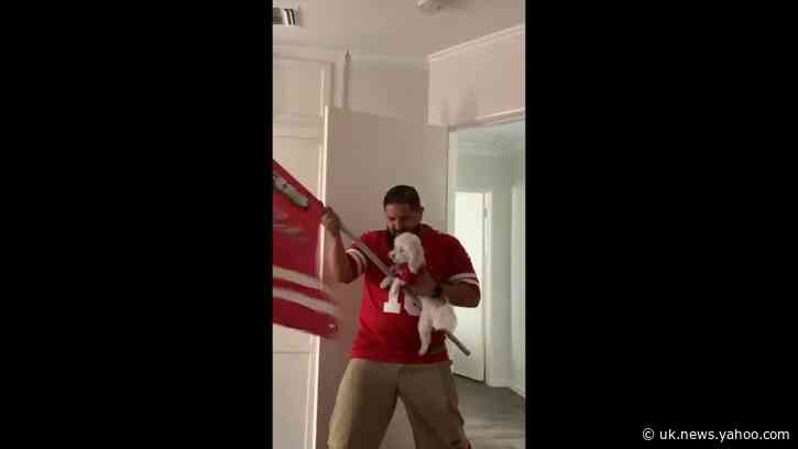 49ers Fan and Dog Celebrate NFL Sunday in Matching Jerseys