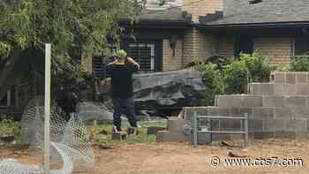 Car flips into backyard during police pursuit - KOSA