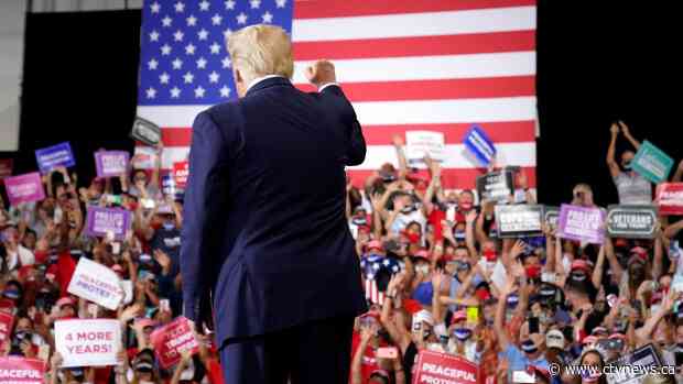 In defiance of Nevada governor, Trump holds indoor rally