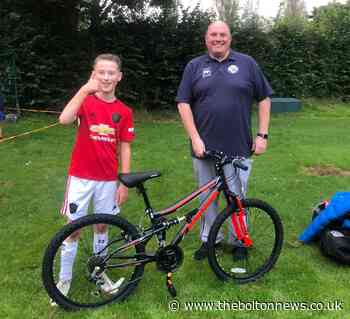 Turton Tigers Football Club player given 'amazing gift' at training after having 2 bikes stolen
