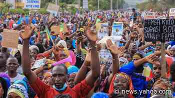 Mali coup: Military agrees to 18-month transition government