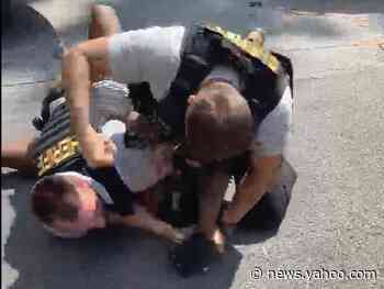 A Georgia sheriff's deputy was fired after he was filmed repeatedly punching a Black man during a traffic stop, authorities say