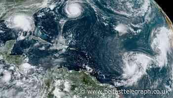 Damage reported as hurricane makes rare landfall in Bermuda