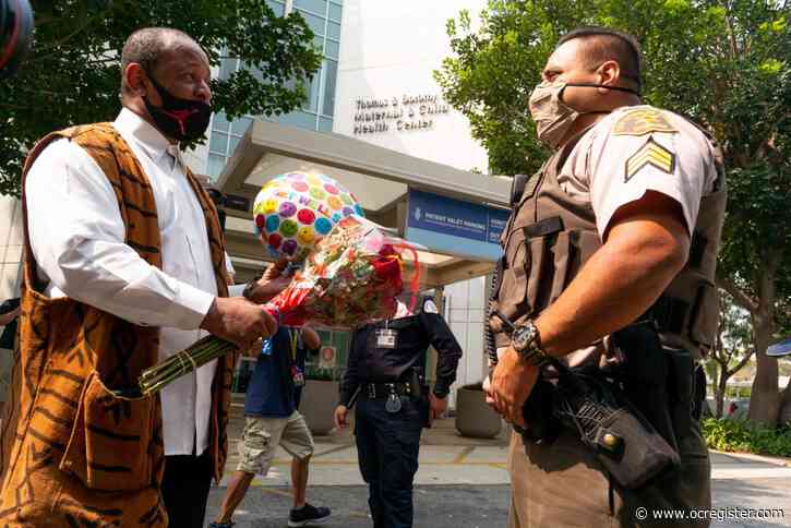 Community leaders pray for L.A. County sheriff’s deputies wounded in ambush