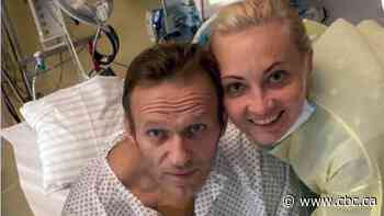 Alexei Navalny seen for 1st time since poisoning, in photo with family