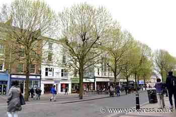 Shop flooded in Parliament Street in York city centre