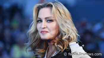 Madonna to direct, co-write biopic about her life
