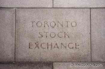 North American stock markets creep higher in early trading, loonie edges lower