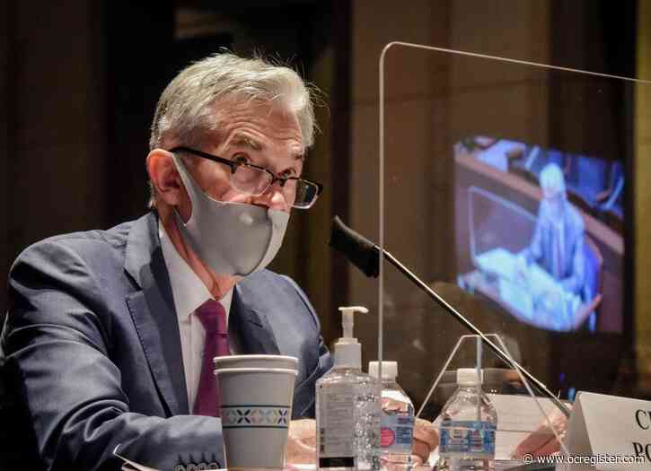 Federal Reserve sees rates near zero at least through 2023