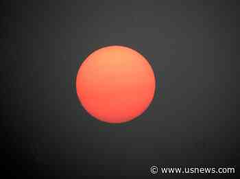 Wildfire Smoke Brings Haze, Vivid Sunsets to East Coast
