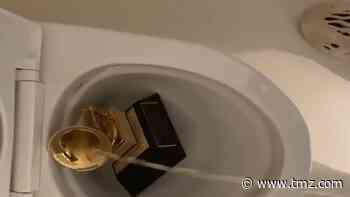 Kanye West Pees on His Own Grammy, Gets Twitter Time-Out