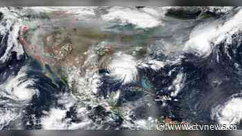 'So many hazards': NASA photo shows North America covered in wildfire smoke as hurricanes move in