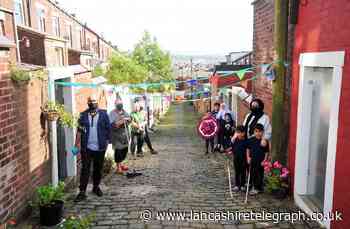 Community spirit in back alley clean up