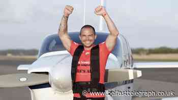 Kickboxer completes marathon pulling a plane