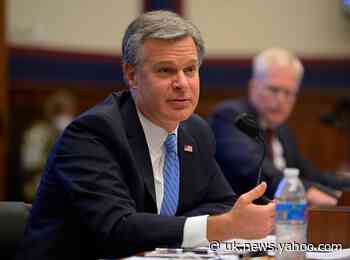 FBI chief warns of Russian efforts to denigrate Joe Biden and undermine confidence in elections with 'steady drumbeat of misinformation'