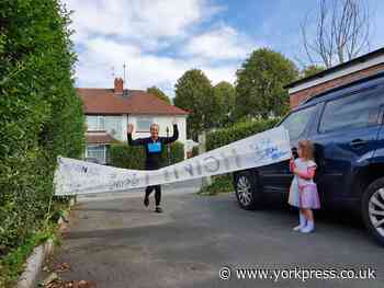 York mum runs virtual half marathon on her own street