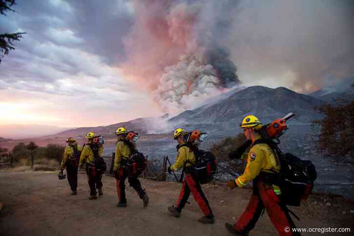 Firefighters battle exhaustion along with wildfire flames