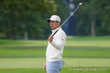The Latest: McIlroy Moves up U.S. Open Leaderboard With 68