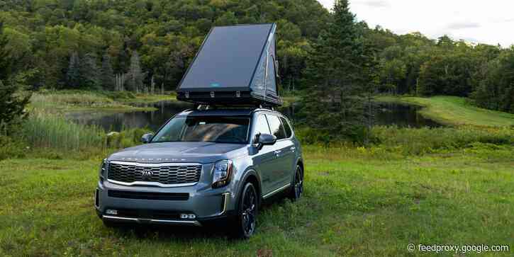 I slept in the Kia Telluride's optional $3,400 roof tent and it made camping fun — even for a longtime hater like me