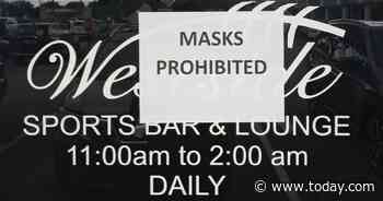 Florida sports bar will ask customers to leave if they wear a mask