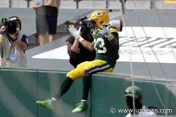 Jones' Big Day Helps Packers Beat Lions 42-21 in Home Opener