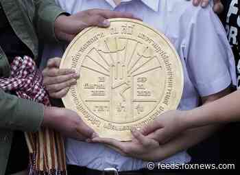 Thailand protesters demand limits to king's power, install 'People's Plaque' near Bangkok palace