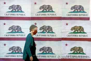 The Latest: California Tops 15K Deaths; Infection Rate Falls