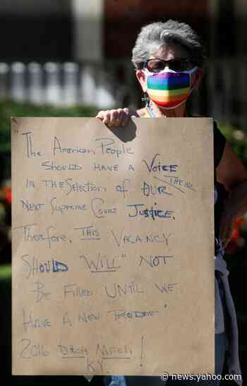 Protesters outside McConnell's home use his own words to demand delay in filling Ginsberg's seat