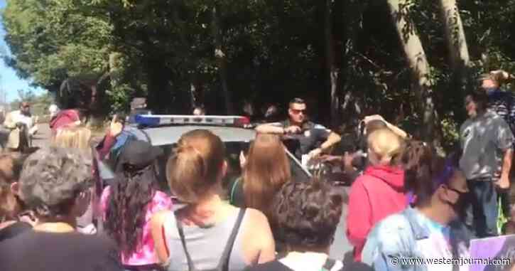 Protesters Retaliate After Arrest Near McConnell’s Home, Storm Nearby Business