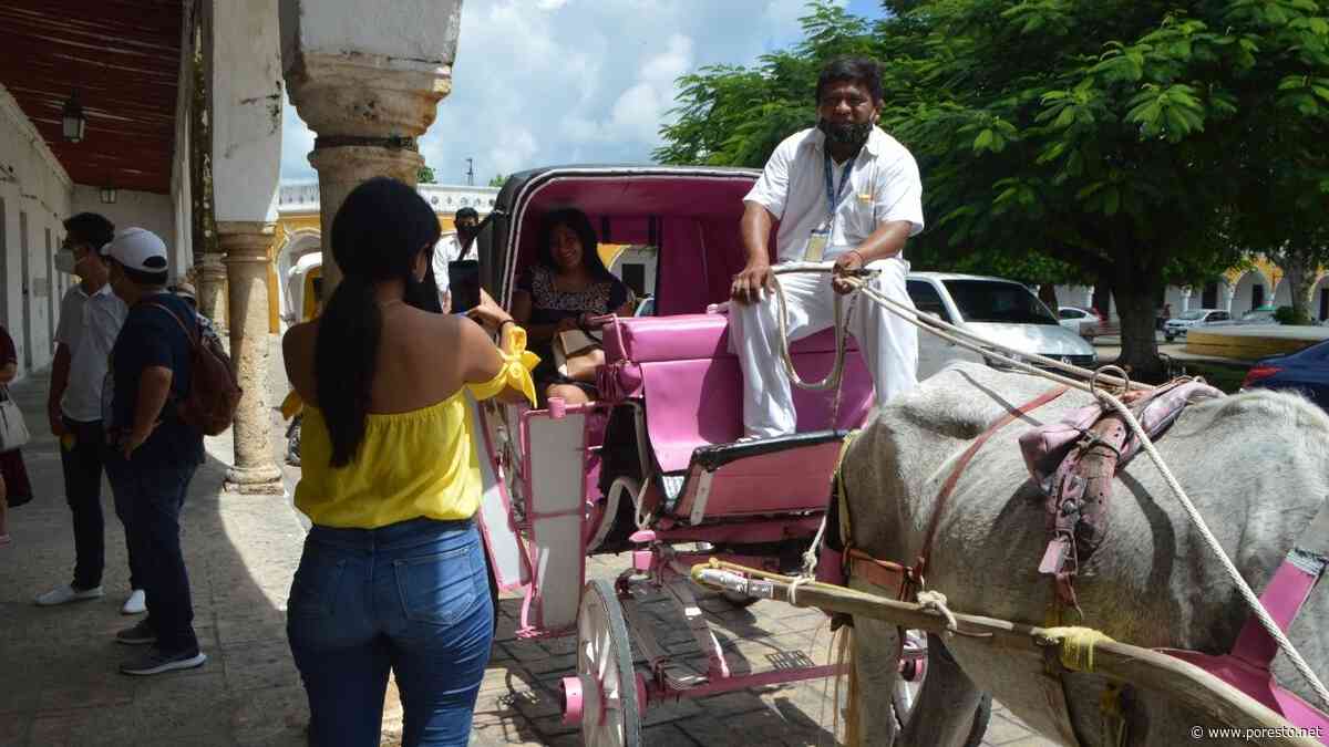 Reportan visita de turistas nacionales en Izamal tras meses de contingencia - PorEsto