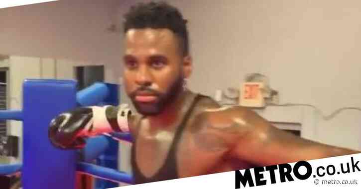 Jason Derulo knocked out by Evander Holyfield as they spar in the boxing ring