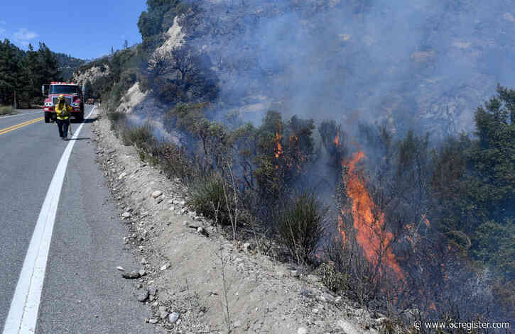 Rockslide cleared for El Dorado firefighters; blaze doesn’t grow overnight