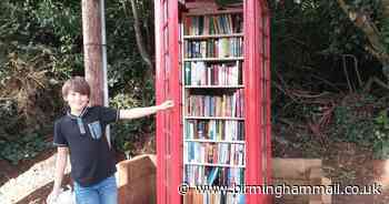 Phone box transformed into 'Tardis' with hundreds of books in Solihull - Birmingham Live