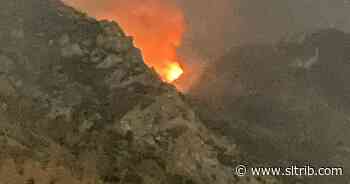 Small wildfire burning near Mount Olympus