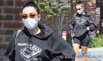 Charli XCX displays her toned pins in activewear shorts after massage treatment in Los Feliz