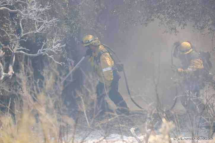 Crews make headway against massive California wildfire