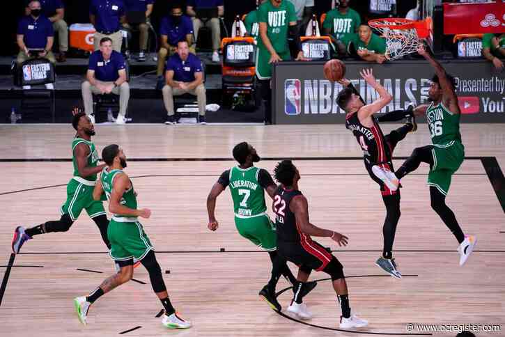 Heat top Celtics, move a game from NBA Finals